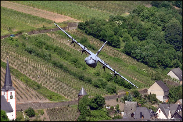 Head-on with 7-8609, flying AZ-North overhead the town of Briedel/Mosel (pilot's fini flight )