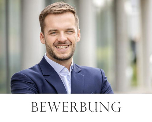 Businessportrait eines lächelnden Mannes im blauen Anzug – Bewerbungsfoto in Erlangen