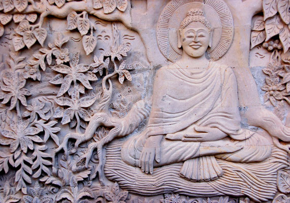 Stone-carved Buddha statue radiating peace and calm.
