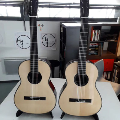 View of the twin guitars by luthier Hervé Lahoun, proudly on display.