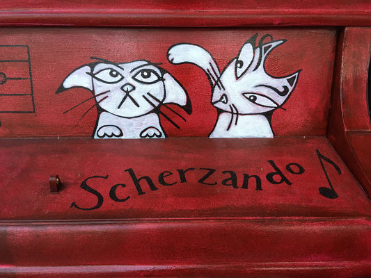 Scherzando means joking, lighthearted or playful.