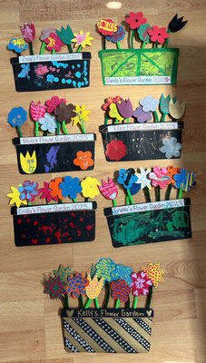 Handmade flower-themed Mother's Day crafts created by children at Custom Kids.