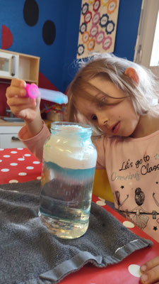 Magic milk science experiment at Custom Kids Science Club.