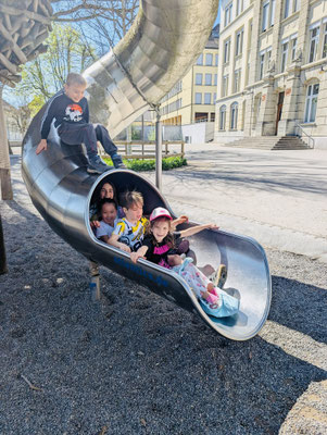 Custom Kids group photo at a playground in Lenzburg