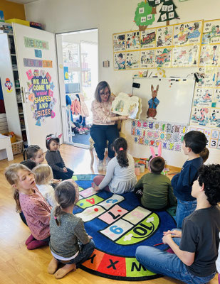 Children taking part in an interactive Easter story and group activity.