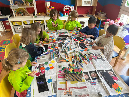 Children enjoying a creative craft workshop at Custom Kids.