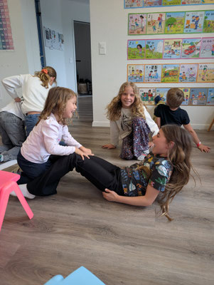 Capturing pure joy after their human bridge collapsed in Science Club.