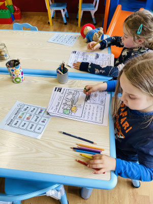 Children developing early learning skills through matching