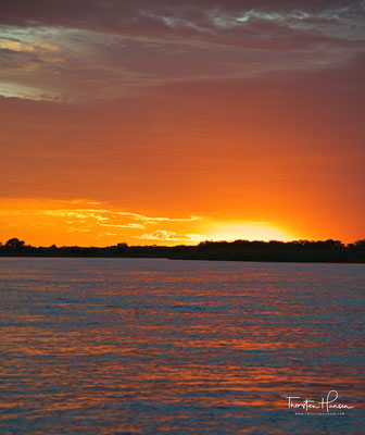 Sonnenuntergang über dem Okavango
