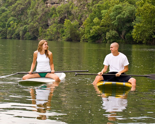 Location sur plan d'eau en couple stand up paddle en Ardèche