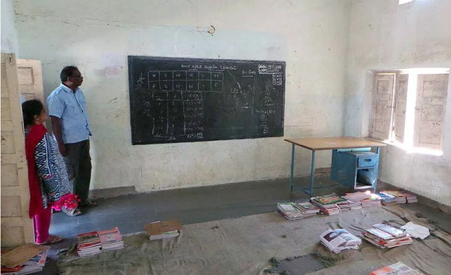 The classroom only had a board, but no seating furniture for the girls.