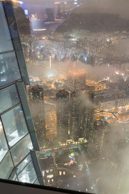 View of Kowloon from sky100 observation deck at 393 m asl.