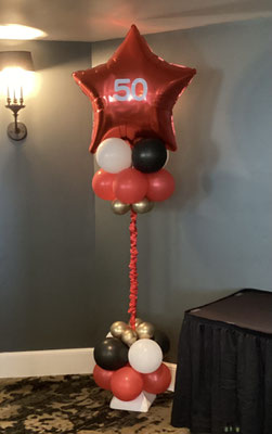 Air-filled balloon cloud Star red white black