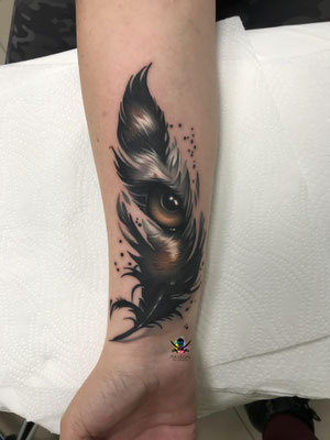 tiger feather tattoo