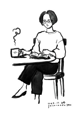 カフェで読書する女性