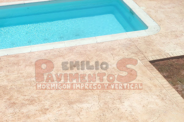 hormigón-impreso-imitación-Manta-con-Cenefa-para-Piscina