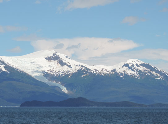 A glacier slides down a mountain near Juneau