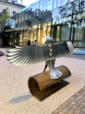OUR EAGLE l 2022 l 155x245x60 cm. W. 75 kg. at Palais Campofranco in Bolzano, Italy. Iron and Corten steel, polished and hammered aluminum
