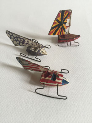 Three Ice Racers  ca. 1962  Eraser, paper clips, Scotch tape, paint. 