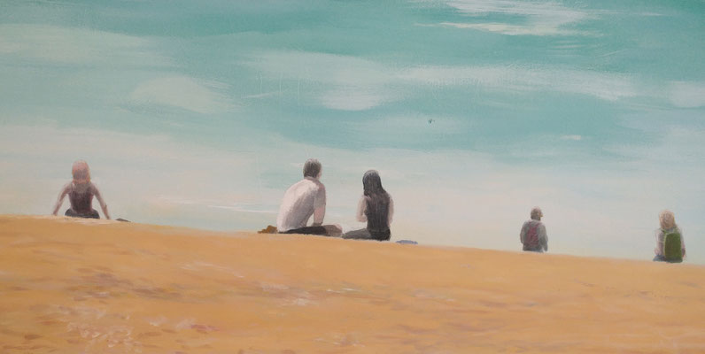 Detail of some of the people sitting on the beach