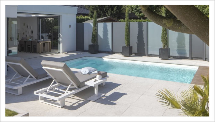 NivoPools Design-Fertigpool im Garten – moderner Pool von Poolbau Rhein-Main
