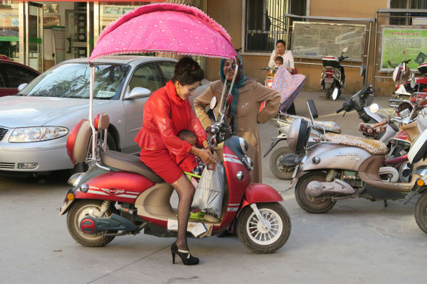 Scooter électrique, et son ombrelle