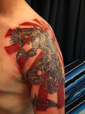 dragon touched up sunrise tattoo