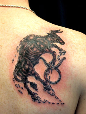 cow symbol tattoo