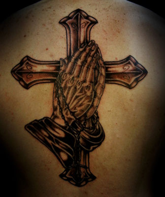 praying hands tattoo