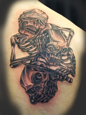 3 skulls tattoo