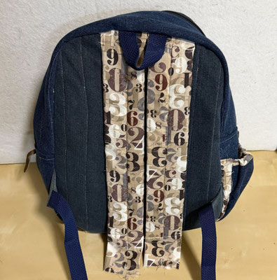 Backpack with unfinished straps