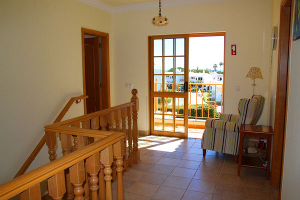 Hallway upstairs between the bedrooms with accsess to the upper terrace. 