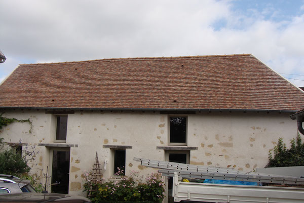 Rénovation d'une toiture en tuiles plate à Hérouville (95)