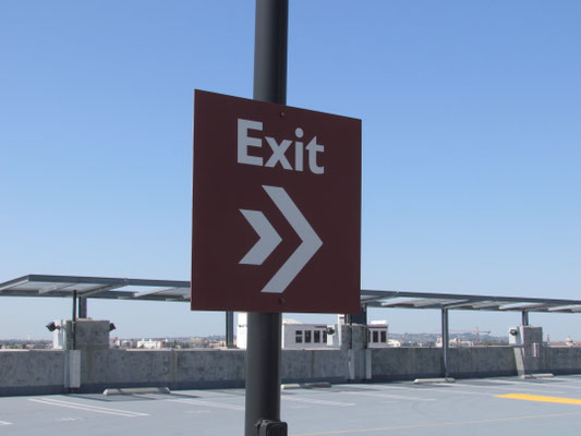 Exit Directional Sign by Landmark Signs Inc.