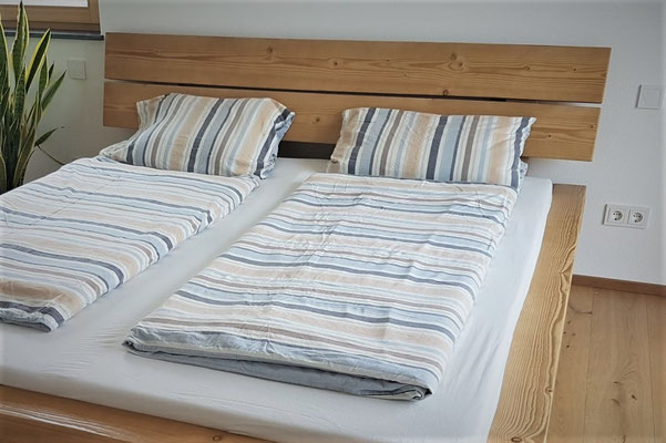 Kopfteil modern am Balkenbett