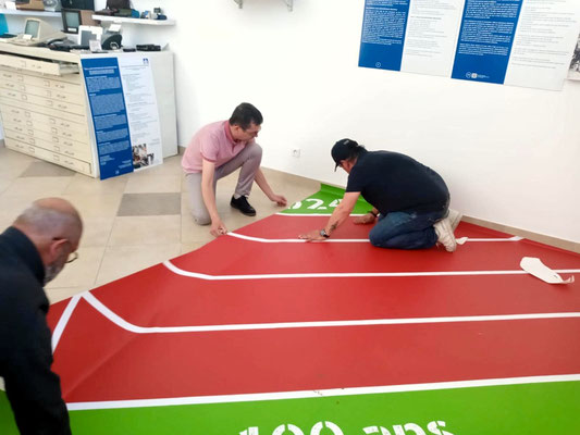Mise en place du tapis au sol