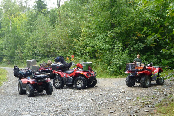 Moving in equipment with ATVs, Mt. Abraham, ME, 2011