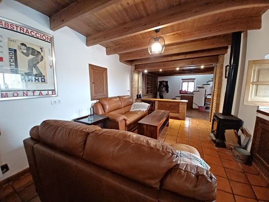 Salón con estufa de leña Alojamiento Rural Cortelazor Casa Maricolilla