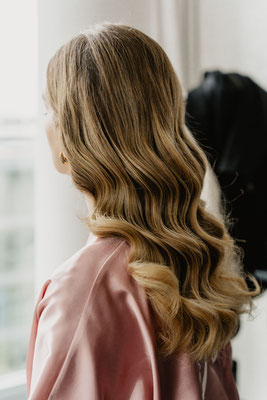 Foto von Wellenfrisur blond