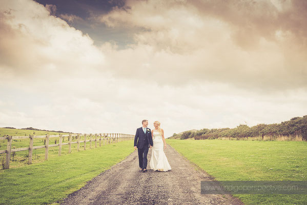 67-ocean-kave-wedding-photography-north-devon-bride-groom-walking