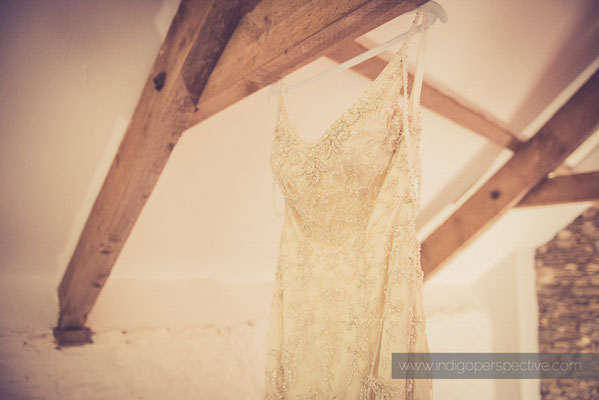 4-westcott-barton-wedding-photography-north-devon-dress-hanging-beams