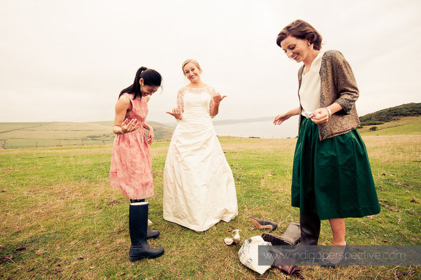 40-woolacombe-barricane-beach-wedding-north-devon-guests-wellies-bride-smiles