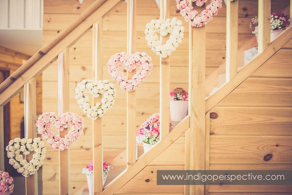 60-wedding-photography-north-devon-venue-decorations-heart-flowers-staircase