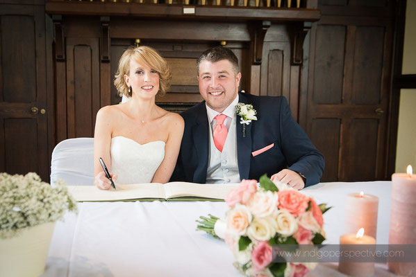 12-woolhanger-manor-wedding-photography-north-devon-signing-register