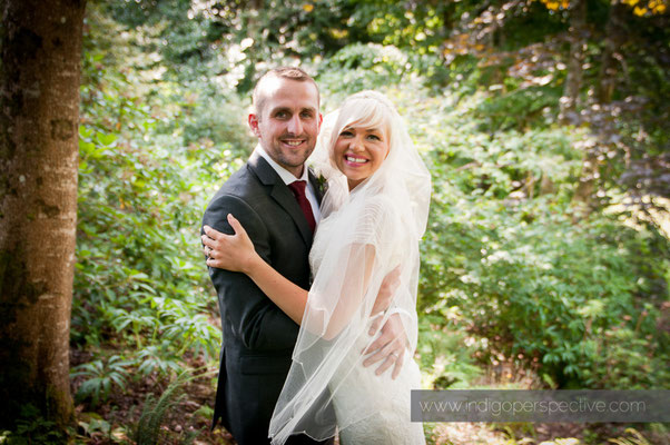 28-weirmarsh-farm-wedding-north-devon-bride-groom-smile-hug