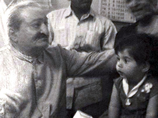 Meher Baba with baby Mehera