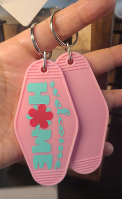 Inspired by the Center's pink keys... my design, cut on a Cricut and assembled in house.