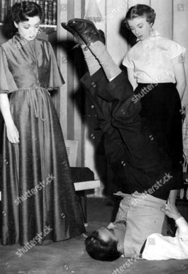 Sir Richard Attenborough demonstrates yoga watchedby Sheila Burrell left and Geraldine  McEwan, in a dress rehearsal scene from Sweet Madness at the Vaudeville Theatre, London -Courtesy of Shutterstock-editorial