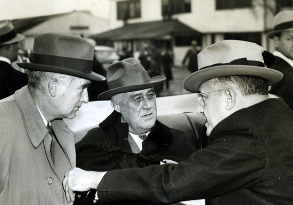 Charles Edison, Assistant Secretary of the Navy; President Roosevelt; and Louis Johnson, Assistant Secretary of War-1938