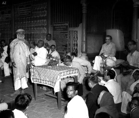 6th Nov.  Meher Baba listening to Saint Gadge Maharaj at his  Dharamshala, Pandharpur